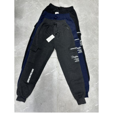 Чоловічі трикотажні брюки з байки. Розміри: M–4XL. Комфортна посадка, манжети внизу, накладна кишеня з принтом. Упаковка: 5 шт., один колір.