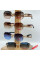 Сонцезахисні окуляри M&C Sunglasses, моделі M552, M551, M540, M530, M533, M544, M543, M520, M517, M505, M5840, M557, трендові оправи та UV-захист.